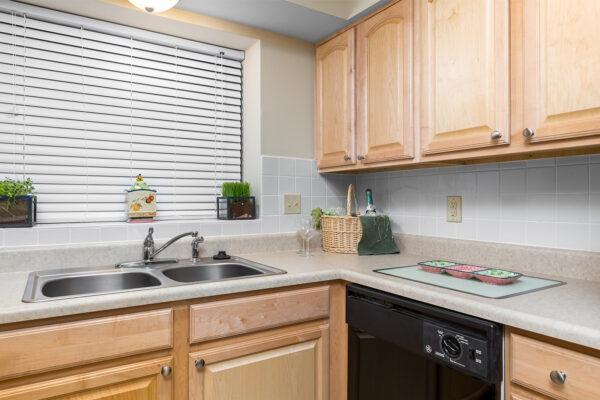 A kitchen countertop with a sink at Chesterfield Village Apartments