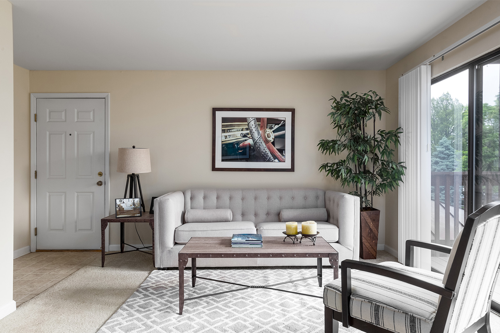 A living room and entry way at Chesterfield Village Apartments