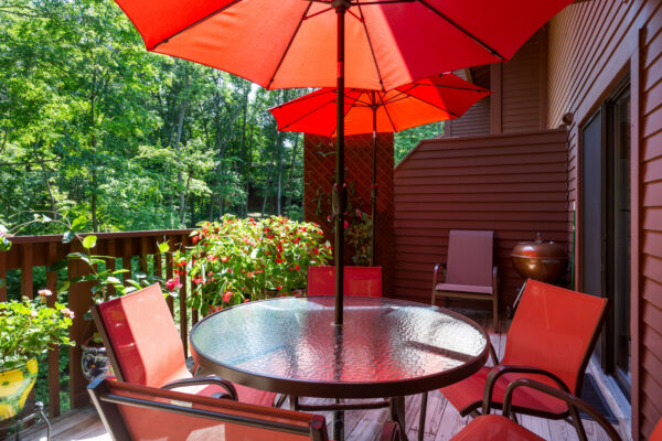 A deck patio with an outdoor view at Chesterfield Village Apartments