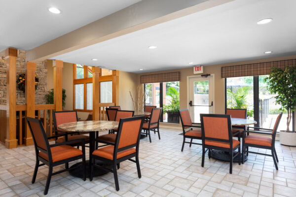 The dining and meeting tables in the clubhouse at Chesterfield Village Apartments