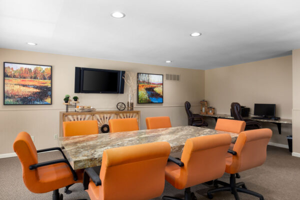 A conference table meeting room at Chesterfield Village Apartments